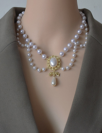 Fashion White Woven Hollow Pearl Tassel Necklace