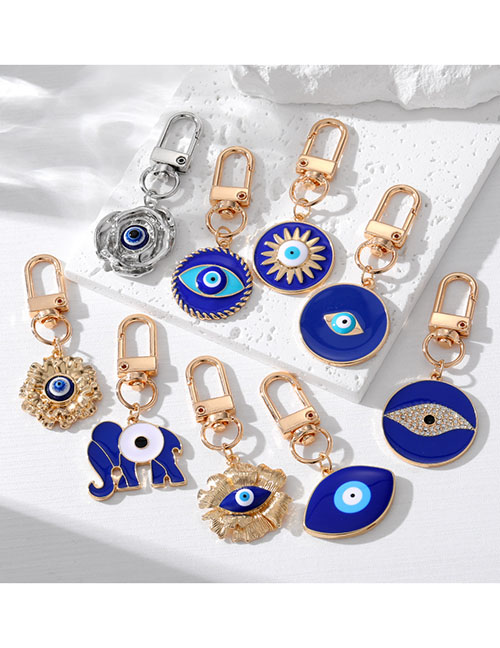 Fashion Deep Blue Flower Eyes Alloy Geometric Drip Oil Eye Flower Keychain